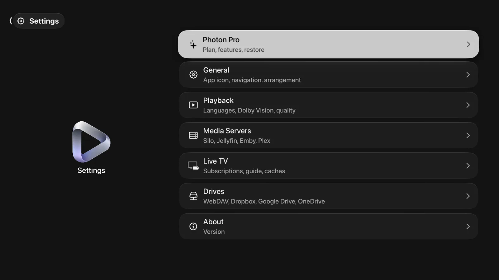 Settings on Apple TV: the seven pages — Photon Pro, General, Playback, Media Servers, Live TV, Drives and About — each with a line saying what is on it.